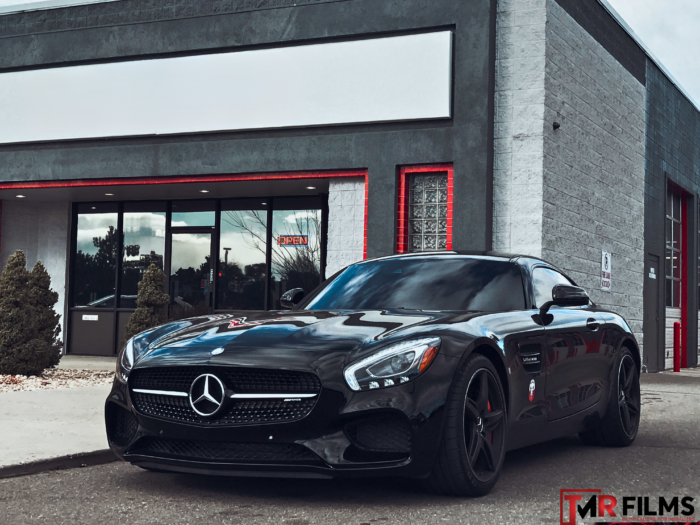 Gray Mercedes with sleek window tint for enhanced privacy and UV protection.
